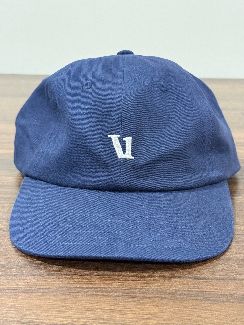 Vuori Navy Cap with White 'V' Logo
